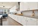 Bright kitchen boasts ample counter space and stainless steel appliances at 2795 Westyn Cove Ln, Ocoee, FL 34761