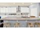 Spacious kitchen featuring granite counters, white cabinetry, and stainless steel appliances at 2795 Westyn Cove Ln, Ocoee, FL 34761