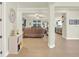 Inviting living room with tile flooring, neutral paint, and an open layout at 2795 Westyn Cove Ln, Ocoee, FL 34761