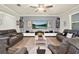Spacious living room featuring modern decor, comfortable seating, and a cozy atmosphere at 2795 Westyn Cove Ln, Ocoee, FL 34761