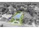 Aerial view highlighting the property boundaries, pool, and surrounding landscape at 303 W Par St, Orlando, FL 32804
