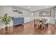 Dining room featuring hardwood floors and decorative wainscoting at 303 W Par St, Orlando, FL 32804