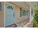 Charming front door with decorative glass and covered porch at 303 W Par St, Orlando, FL 32804