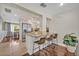 Open kitchen with bar seating and stainless steel appliances at 303 W Par St, Orlando, FL 32804