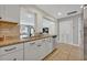 Updated kitchen with white cabinets and granite countertops at 303 W Par St, Orlando, FL 32804