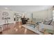 Bright living room with hardwood floors and comfortable seating at 303 W Par St, Orlando, FL 32804