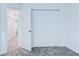 A bright bedroom features a large closet with folding doors and neutral carpet, creating a cozy space at 3239 Laurent Loop, Davenport, FL 33837