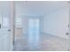 Bright living room features an open floor plan and a sliding glass door, perfect for modern living at 3239 Laurent Loop, Davenport, FL 33837