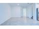 An open and bright living room with tile floor, offering a flexible space for comfortable living and entertaining at 3239 Laurent Loop, Davenport, FL 33837