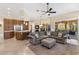 Open living space featuring kitchen, dining and living area with smooth transition to outdoor living at 3418 Turningwind Ln, Winter Garden, FL 34787