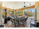 Spacious screened-in patio with dining and living area, perfect for enjoying the outdoors at 3418 Turningwind Ln, Winter Garden, FL 34787