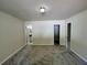 Neutral bedroom features multiple doorways and ample floor space at 3530 Forest Branch Dr # F, Port Orange, FL 32129