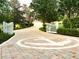 Impressive driveway with an anchor inlay leading to a beautiful estate at 4 Island Dr, Lake Mary, FL 32746