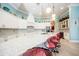 This kitchen boasts a large island, pendant lighting, stainless steel appliances and ample cabinet space at 4 Island Dr, Lake Mary, FL 32746