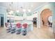An open-concept kitchen featuring a large island, quartz countertops and stainless steel appliances at 4 Island Dr, Lake Mary, FL 32746
