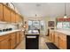 Charming kitchen with ample counter space, a functional island, and natural light at 433 Arcadia Lakes Dr, The Villages, FL 32162