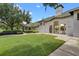 Elegant clubhouse exterior showcasing manicured landscaping, traditional architecture, and inviting entrance at 4350 New Broad St, Orlando, FL 32814