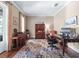 Bright home office space with ample natural light, hardwood floors, and traditional furnishings at 4350 New Broad St, Orlando, FL 32814