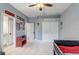 Spacious bedroom with a ceiling fan, double closets, and decor at 440 Skyview Pl, Chuluota, FL 32766
