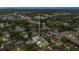 High-altitude aerial view of a home's surroundings, pinpointing its location with respect to major roads and nearby homes at 4436 Larado Pl, Orlando, FL 32812