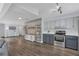Bright living space with an open layout to the kitchen, featuring modern finishes at 4436 Larado Pl, Orlando, FL 32812