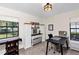 Office with work space, natural lighting, a neutral color scheme, and storage at 445 Songbird Way, Apopka, FL 32712
