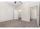Bright bedroom features neutral carpet and closet with a door at 5871 Alenlon Way, Mount Dora, FL 32757