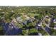 Aerial view of community amenities including tennis courts, pool, and ample parking at 611 Green Briar Blvd, Altamonte Springs, FL 32714