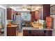 Modern kitchen featuring granite countertops, updated appliances, and ample cabinet space at 611 Green Briar Blvd, Altamonte Springs, FL 32714