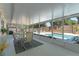 Enclosed patio featuring dining furniture, plants, and a view of the pool and backyard at 611 Green Briar Blvd, Altamonte Springs, FL 32714