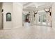 Bright living room with French doors to a backyard pool at 612 Stonefield Loop, Lake Mary, FL 32746