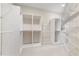 Custom walk-in closet with organized shelves, hanging rods, and carpeted flooring at 612 Stonefield Loop, Lake Mary, FL 32746