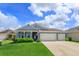Beautiful single-Gathering home with a well-kept lawn and a three-car garage, perfect for a growing Gathering at 6960 Audobon Osprey Cv, Harmony, FL 34773