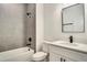 Modern bathroom featuring tile walls, shower and new sink at 701 Marion Oaks Trl, Ocala, FL 34473