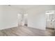 Spacious bedroom featuring light floors, an ensuite bathroom, and a walk-in closet at 701 Marion Oaks Trl, Ocala, FL 34473