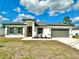 Charming single-story home with fresh landscaping at 701 Marion Oaks Trl, Ocala, FL 34473