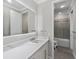 Tastefully designed bathroom features a sleek vanity and mirror, and a stylish shower with a tub at 711 Windlass Ct, Kissimmee, FL 34746