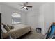 Neutral bedroom with light walls, closet and window for ample light at 772 Pickfair Ter, Lake Mary, FL 32746