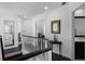 Upstairs landing features a dark wood floor and a decorative table at 772 Pickfair Ter, Lake Mary, FL 32746