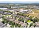 Aerial view of a Gathering friendly neighborhood with a school and recreational facilities nearby at 7809 Purple Finch St, Winter Garden, FL 34787