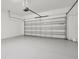 Spacious two car garage ready for parking or storage at 7809 Purple Finch St, Winter Garden, FL 34787