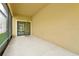 Screened in porch with an outdoor fan and a view of the yard at 7809 Purple Finch St, Winter Garden, FL 34787