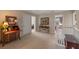A cozy loft space with elegant furniture, artwork, and access to bedrooms, creating a comfortable retreat at 8208 Westminster Abbey Blvd, Orlando, FL 32835