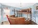 The themed bedroom features a custom made pirate ship bunk bed with sleeping for multiple children at 8404 Secret Key Cv, Kissimmee, FL 34747