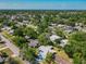 A lush aerial view showcasing the property's neighborhood location with beautiful surrounding landscape at 1228 Vantage Dr, Orlando, FL 32806