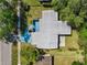 This house features a backyard patio and well maintained landscaping at 1228 Vantage Dr, Orlando, FL 32806