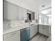 Beautiful kitchen featuring updated cabinets, stainless steel appliances, and modern countertops at 1228 Vantage Dr, Orlando, FL 32806