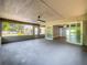 View of the patio with a ceiling fan and sliding doors leading to the interior at 1228 Vantage Dr, Orlando, FL 32806