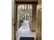 Inviting courtyard entrance showcases lush landscaping and a serene walkway, creating a tranquil atmosphere at 12527 Floridays Resort Dr # 311E, Orlando, FL 32821