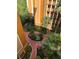 Scenic view of a well-maintained courtyard with lush greenery, colorful flowers, and walking paths at 12527 Floridays Resort Dr # 603E, Orlando, FL 32821